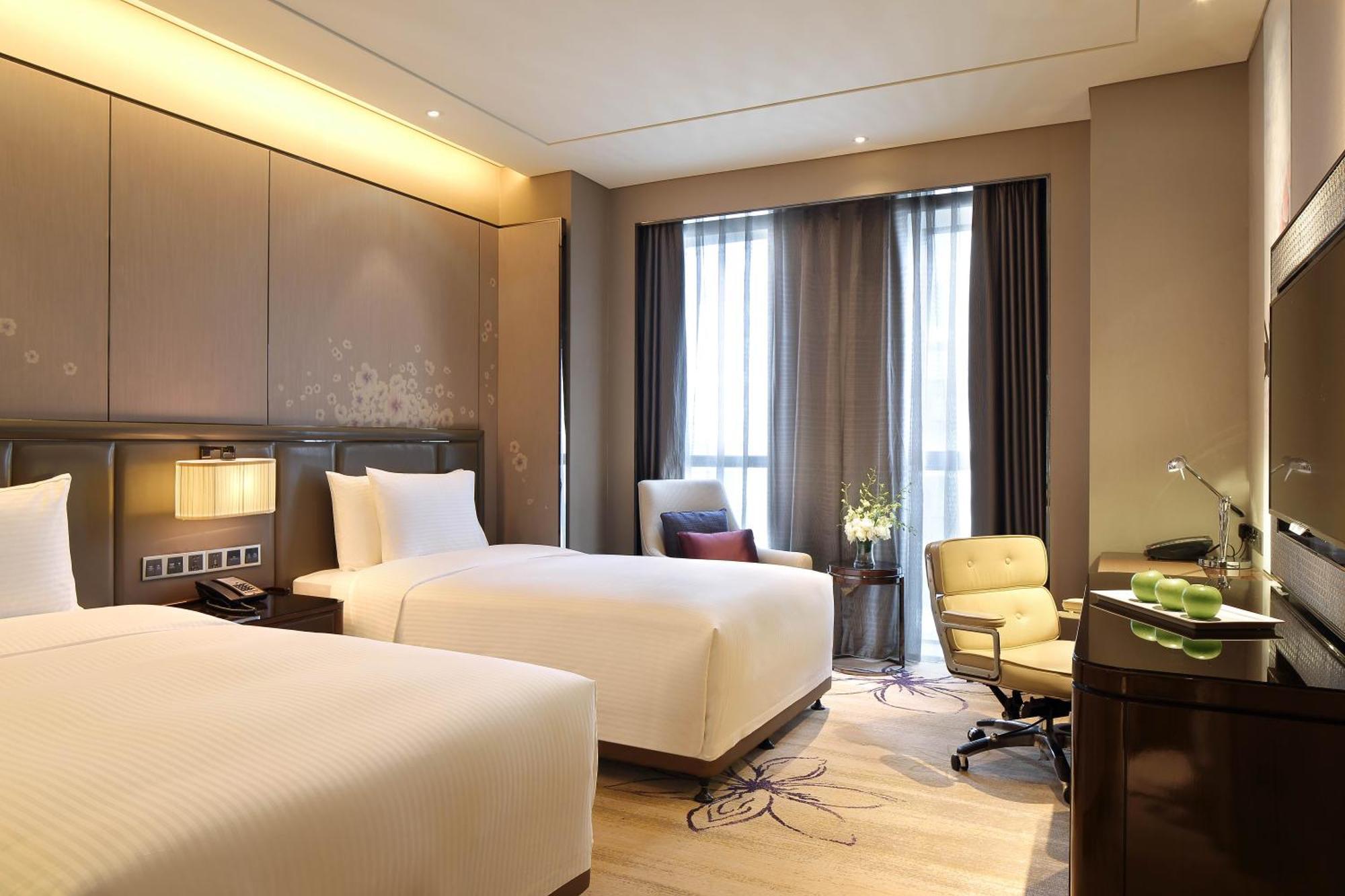 Wanda Realm Guangyuan Hotel Exterior photo